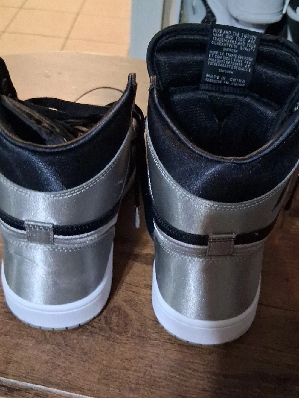 Jordan Men’s High-Top Sneakers in Black & Silver